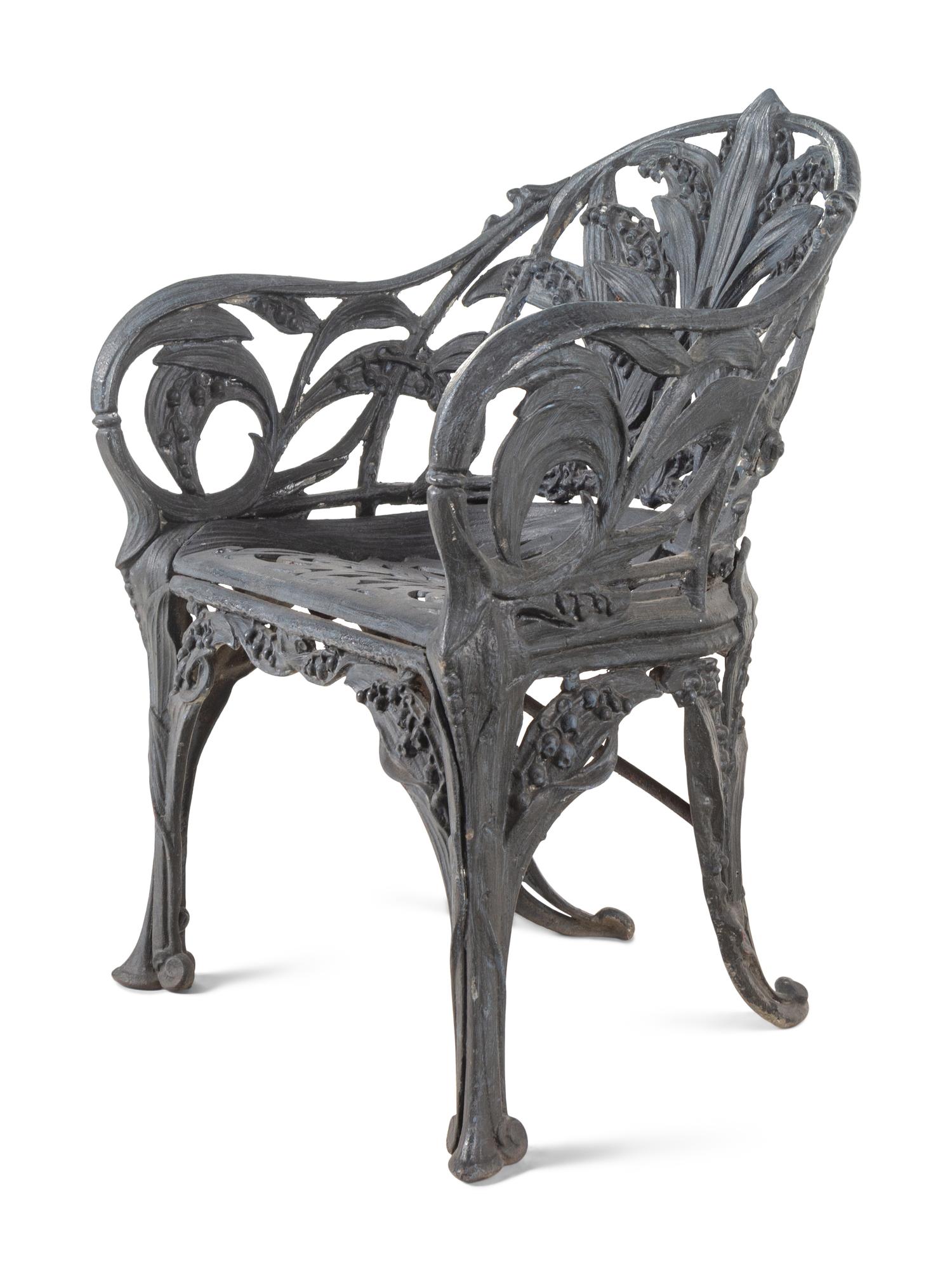 A Set of Four English Cast Iron Garden Chairs