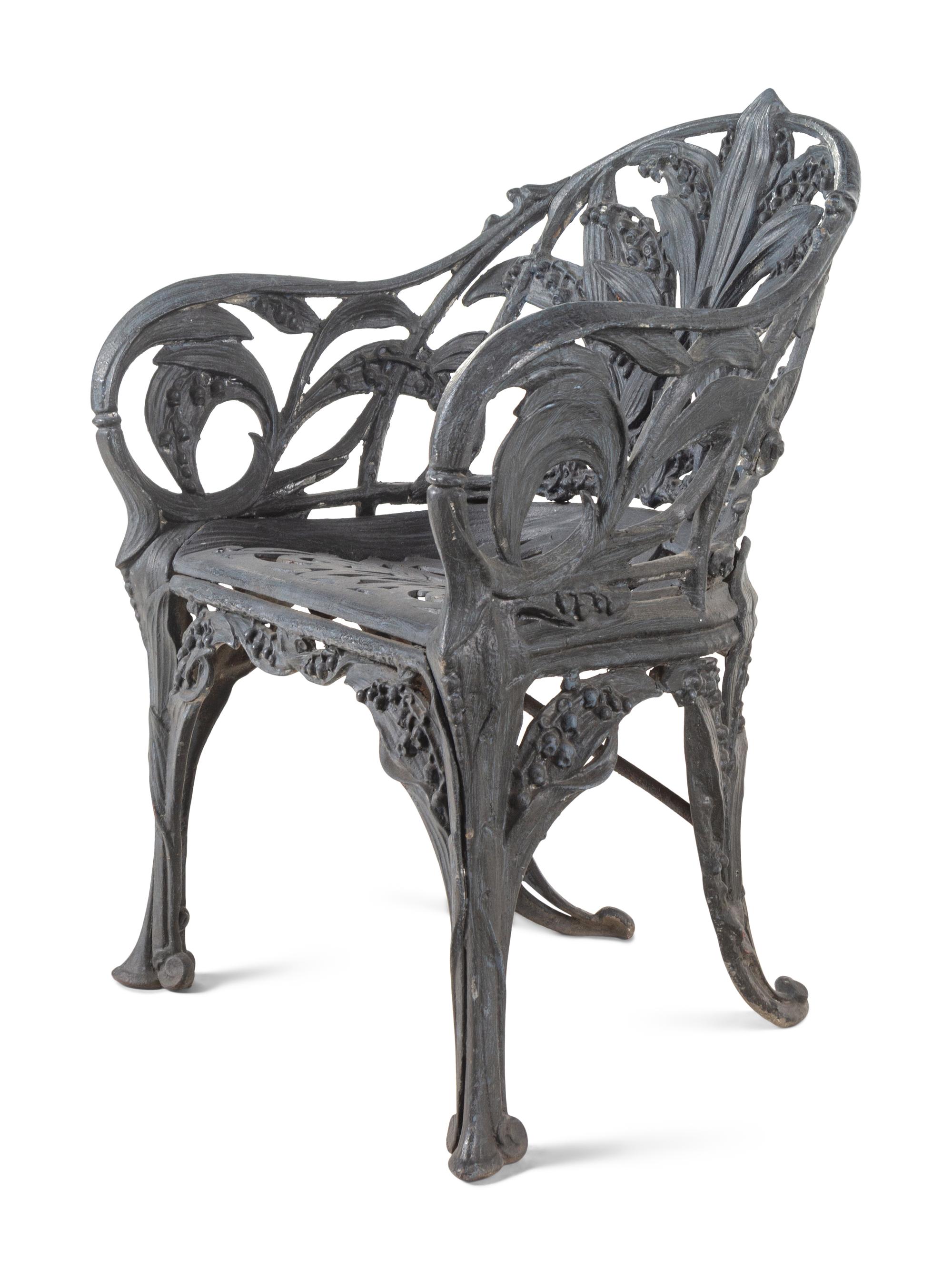 A Set of Four English Cast Iron Garden Chairs