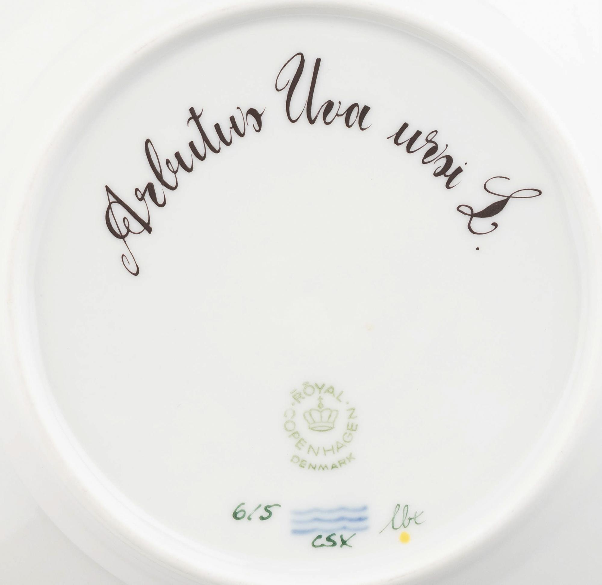 A Set of Eight Royal Copenhagen Flora Danica Porcelain Bread Plates