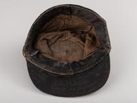 [CIVIL WAR]. Company C, 179th Pennsylvania 1858 forage cap, with identification to J.K. Hunsleker carved into visor.
