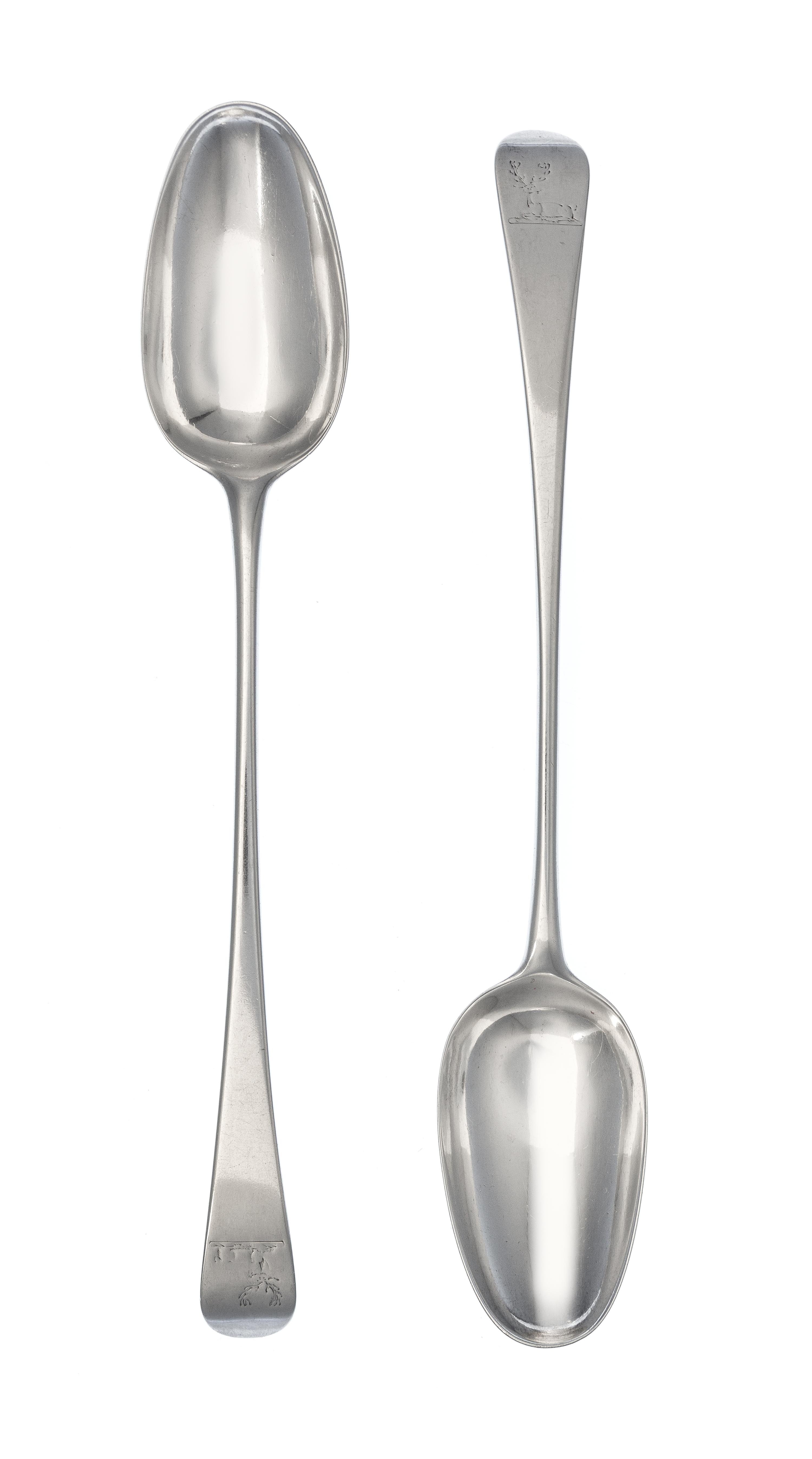 A Pair of George III Silver Serving Spoons, William Fearn, London, 1776, the Old English handle with an engraved crest of a stag lodged