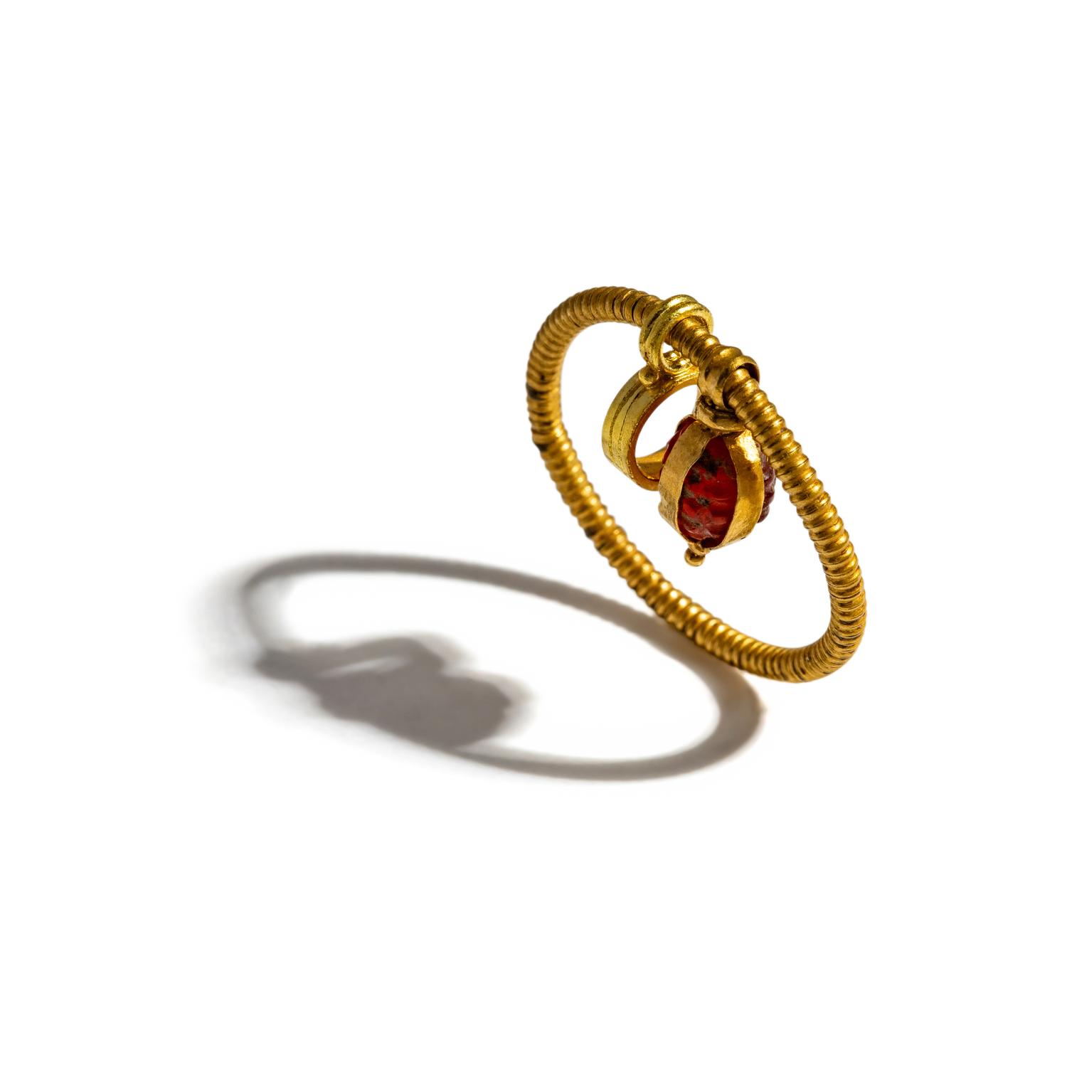 A Roman Gold and Carnelian Earring