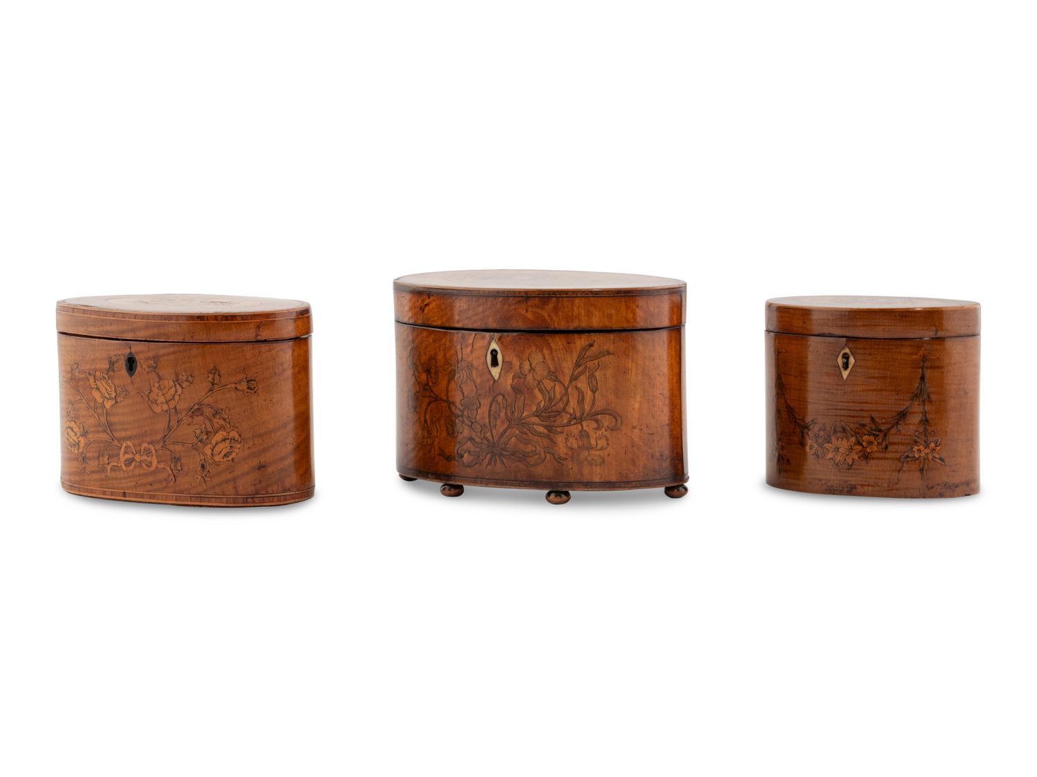 A Group of Three George III Marquetry Tea Caddies
