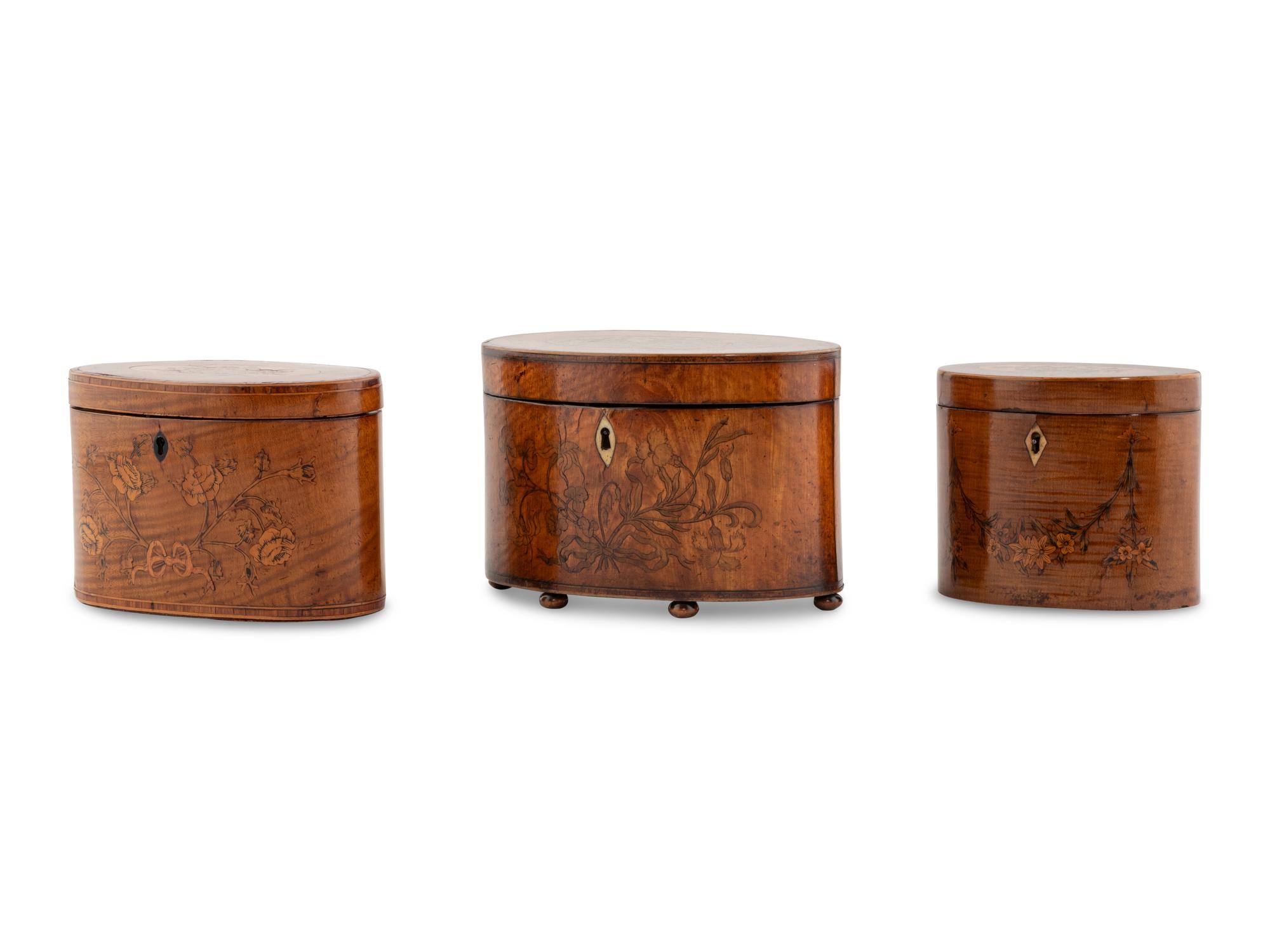 A Group of Three George III Marquetry Tea Caddies