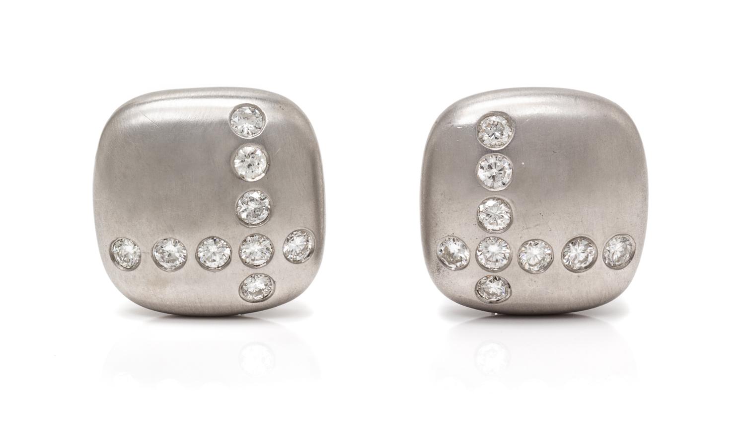 A Pair of 18 Karat White Gold and Diamond Earclips, Carvin French, 17.50 dwts.