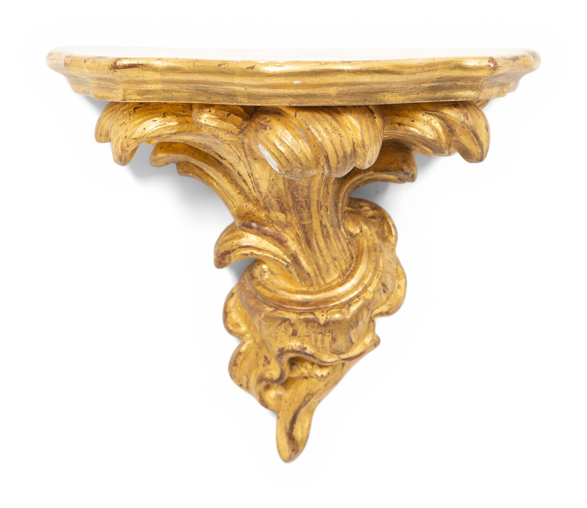 A Group of Five Gilt Wall Brackets