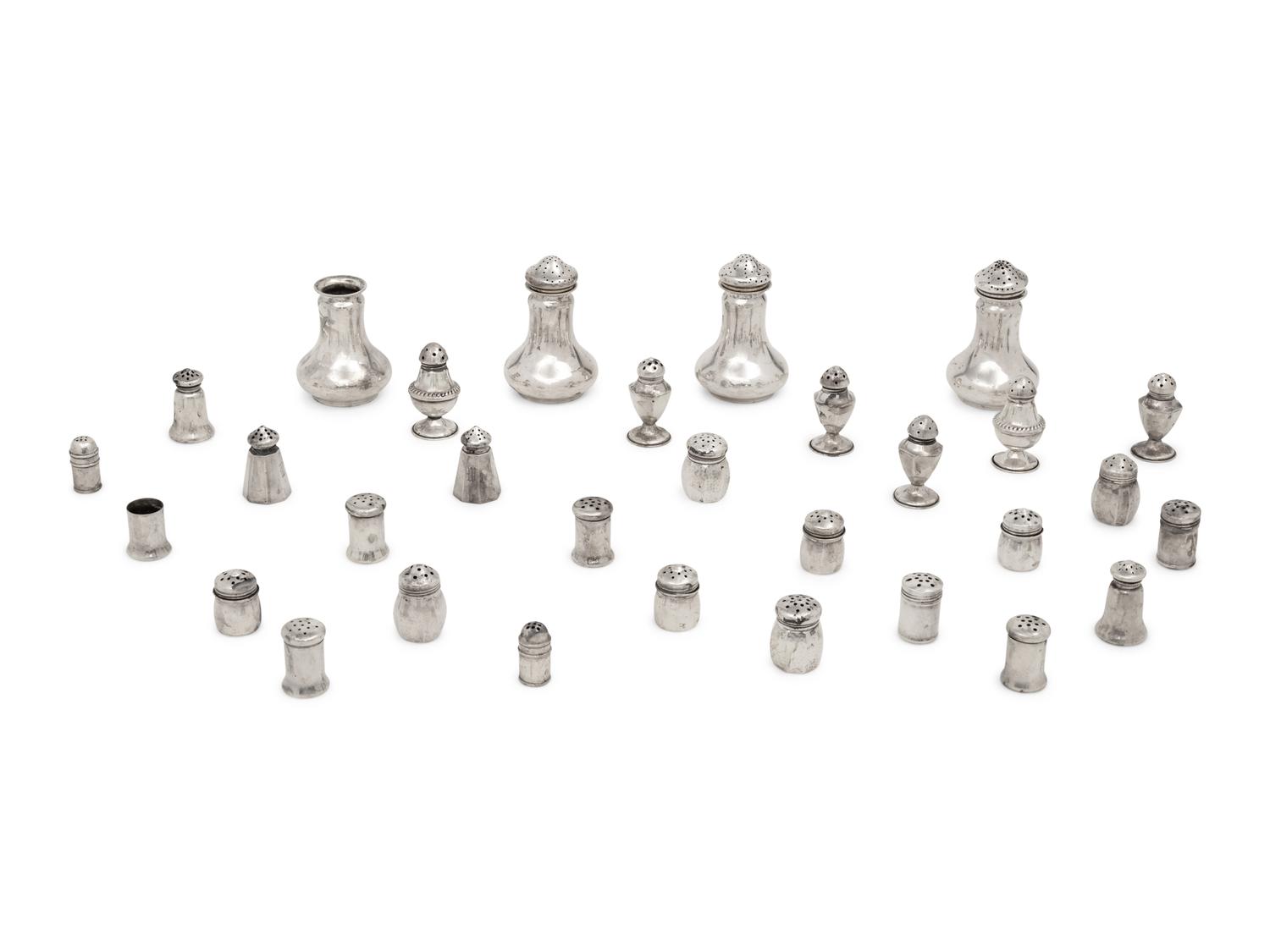A Large Collection of Silver Casters