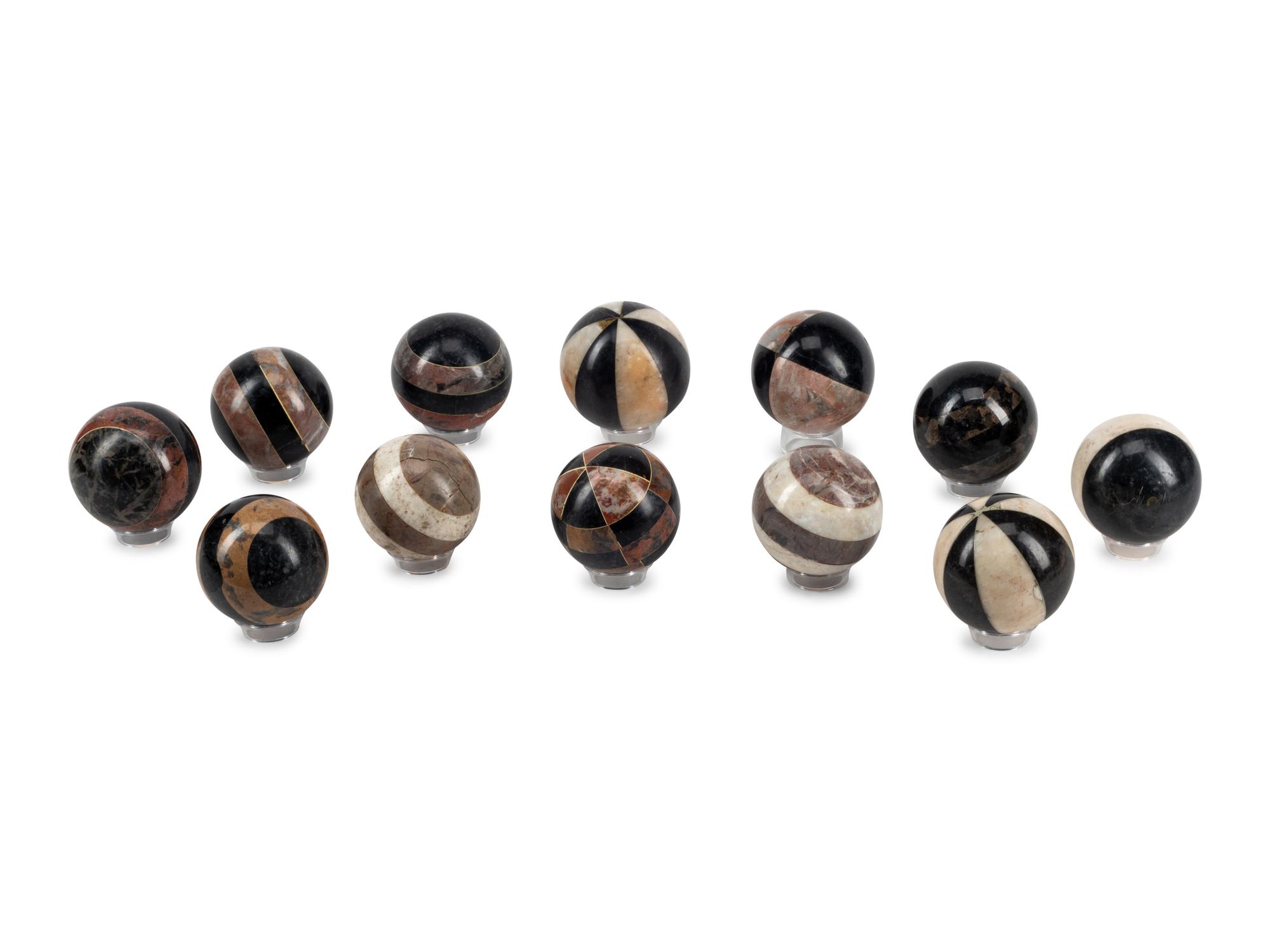 A Set of Twelve Specimen Marble Spherical Ornaments