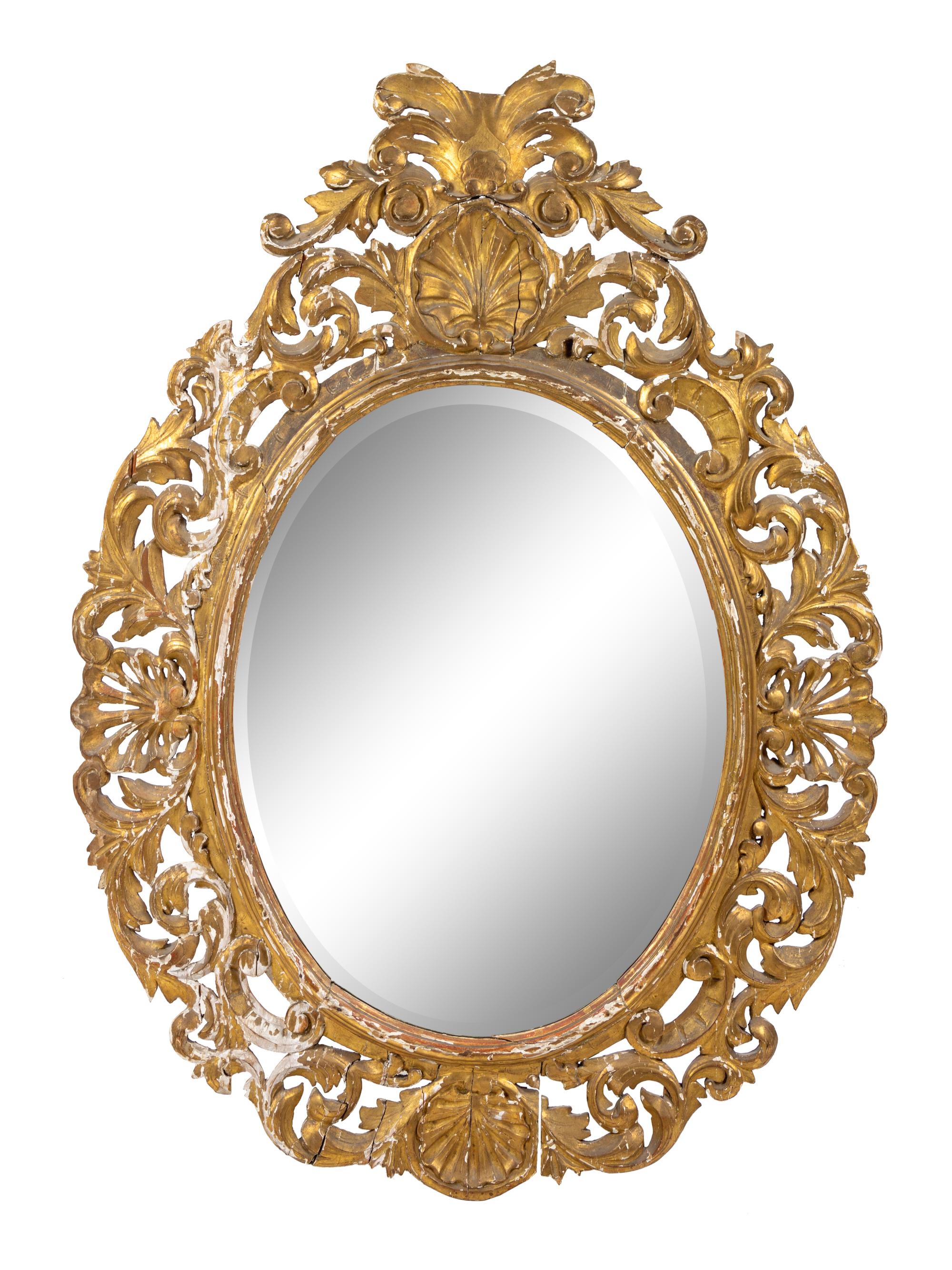 An Italian Baroque Style Giltwood Mirror