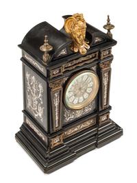 A French Gilt Bronze Mounted and Porcelain-Inset Black Marble Clock