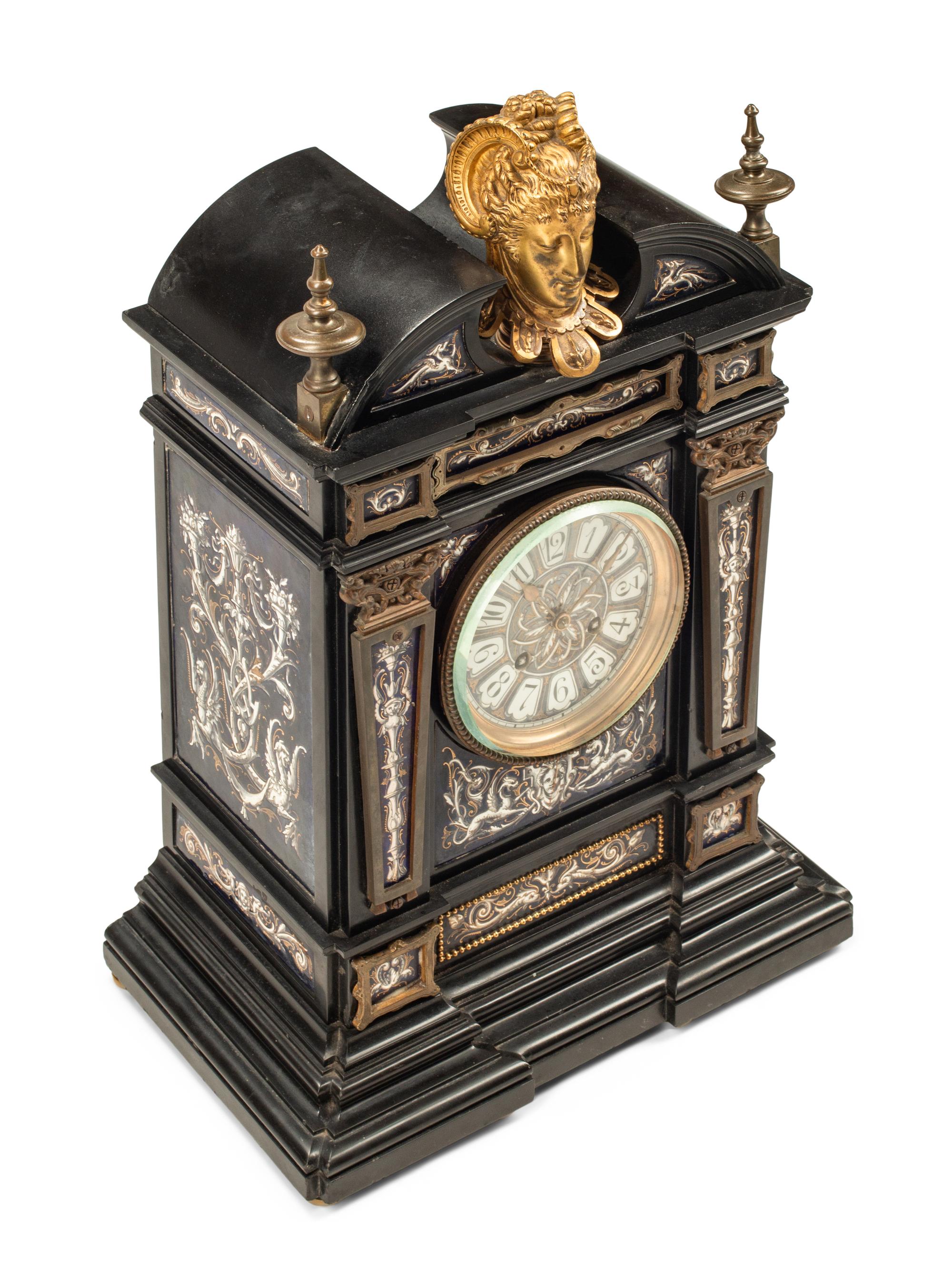 A French Gilt Bronze Mounted and Porcelain-Inset Black Marble Clock