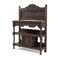 An Elizabethan Style Carved Oak Three-Tier Server