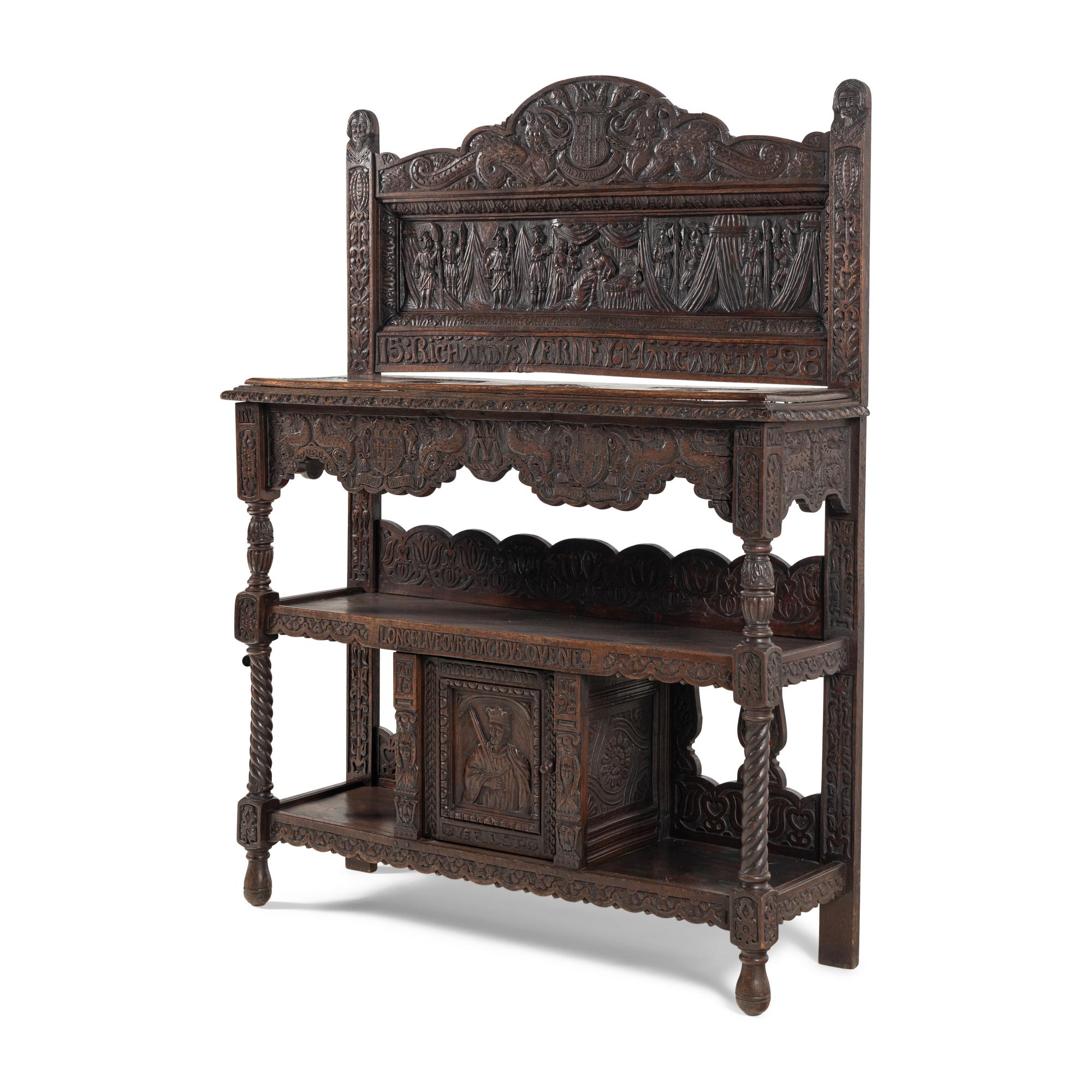 An Elizabethan Style Carved Oak Three-Tier Server