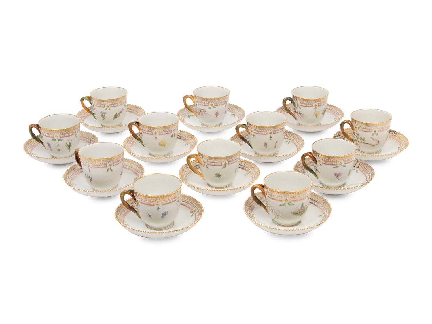A Set of Twelve Royal Copenhagen Flora Danica Porcelain Teacups and Saucers