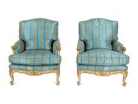 A Pair of Louis XV Style Painted and Parcel Gilt Bergeres