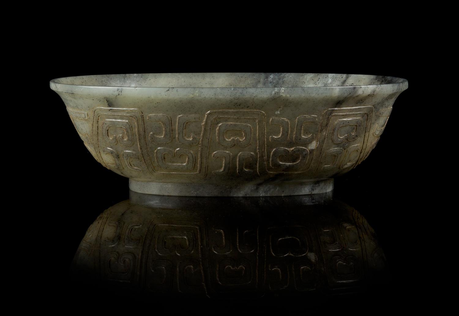 A Black and White Jade Bowl Length 6 1/2 inches. — 18TH/19TH CENTURY