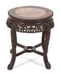 A Chinese Carved Hardwood Table with Inset Marble Top — 19TH CENTURY