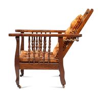 A Victorian Carved Mahogany and Tufted Velvet Upholstered Child's Reclining Armchair