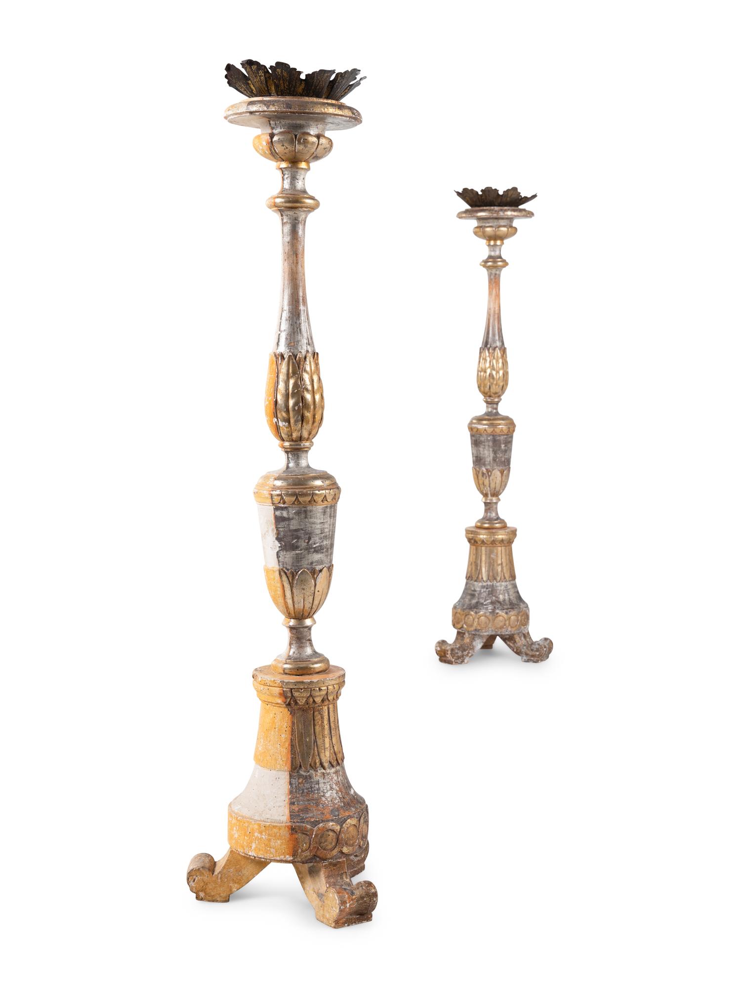 A Pair of Italian Painted and Parcel-Gilt Pricket Sticks