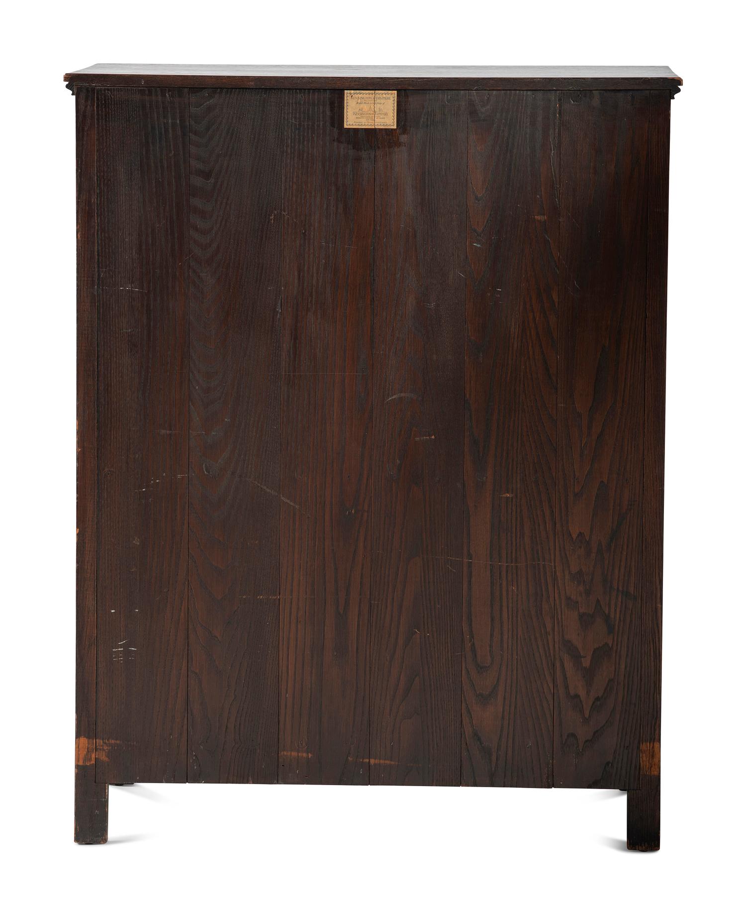 A Jacobean Style Carved Oak Cabinet