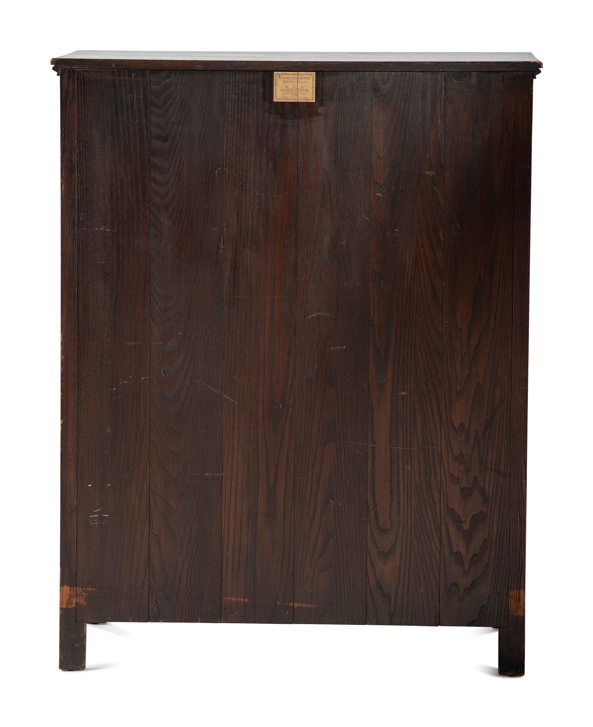 A Jacobean Style Carved Oak Cabinet