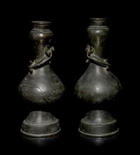 A Pair of Chinese Bronze Bottle Vases