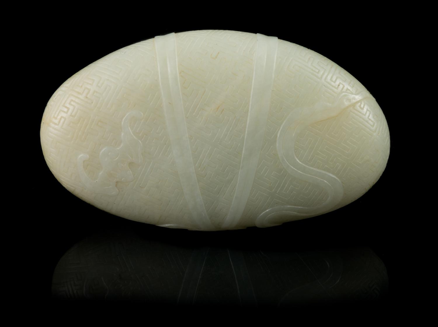 A Pale Celadon Jade Pebble Length 3 3/4 inches. — 18TH/19TH CENTURY