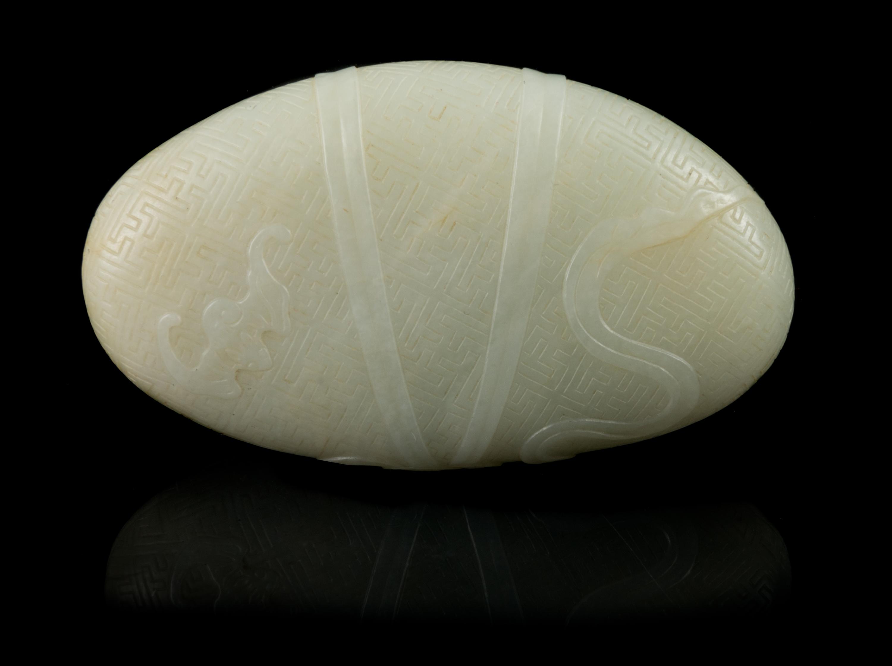A Pale Celadon Jade Pebble Length 3 3/4 inches. — 18TH/19TH CENTURY