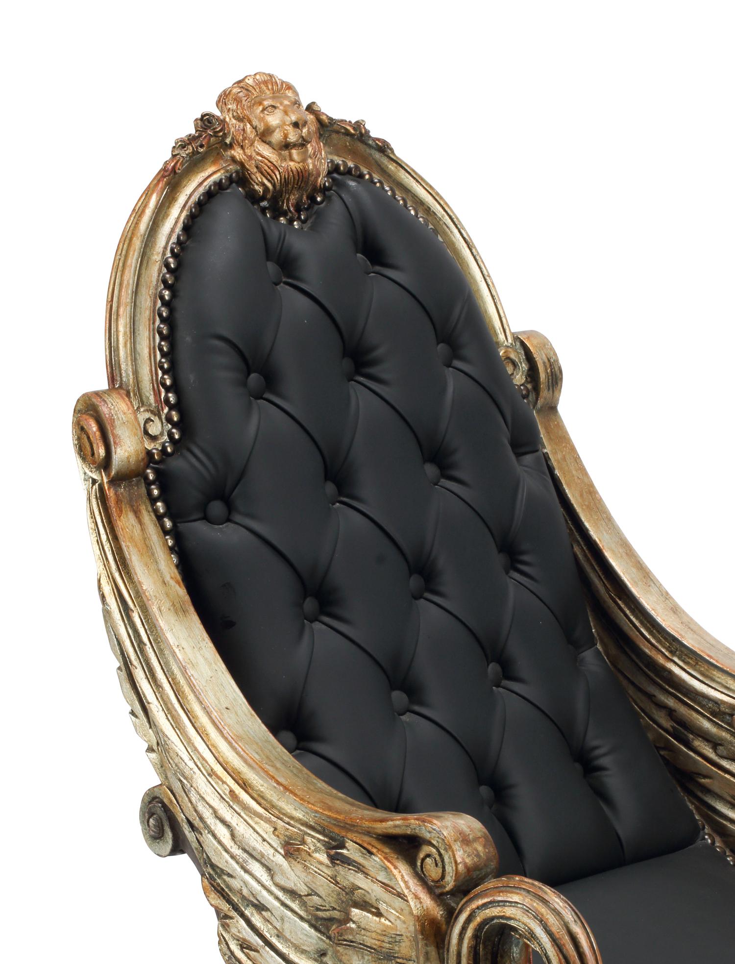 An Italian "Grotto" Style Carved Giltwood Rocking Chair