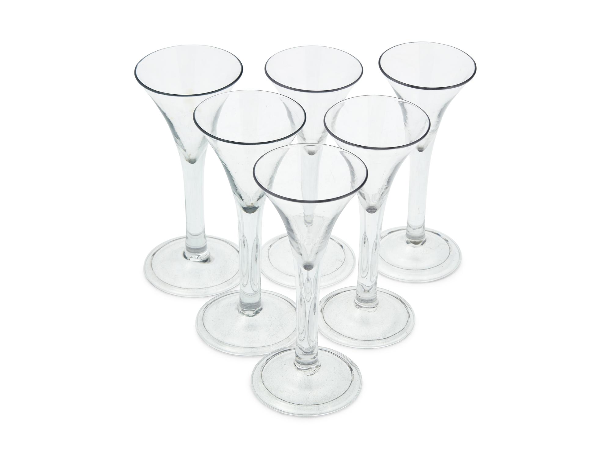 A Set of Six George III Blown Wine Glasses