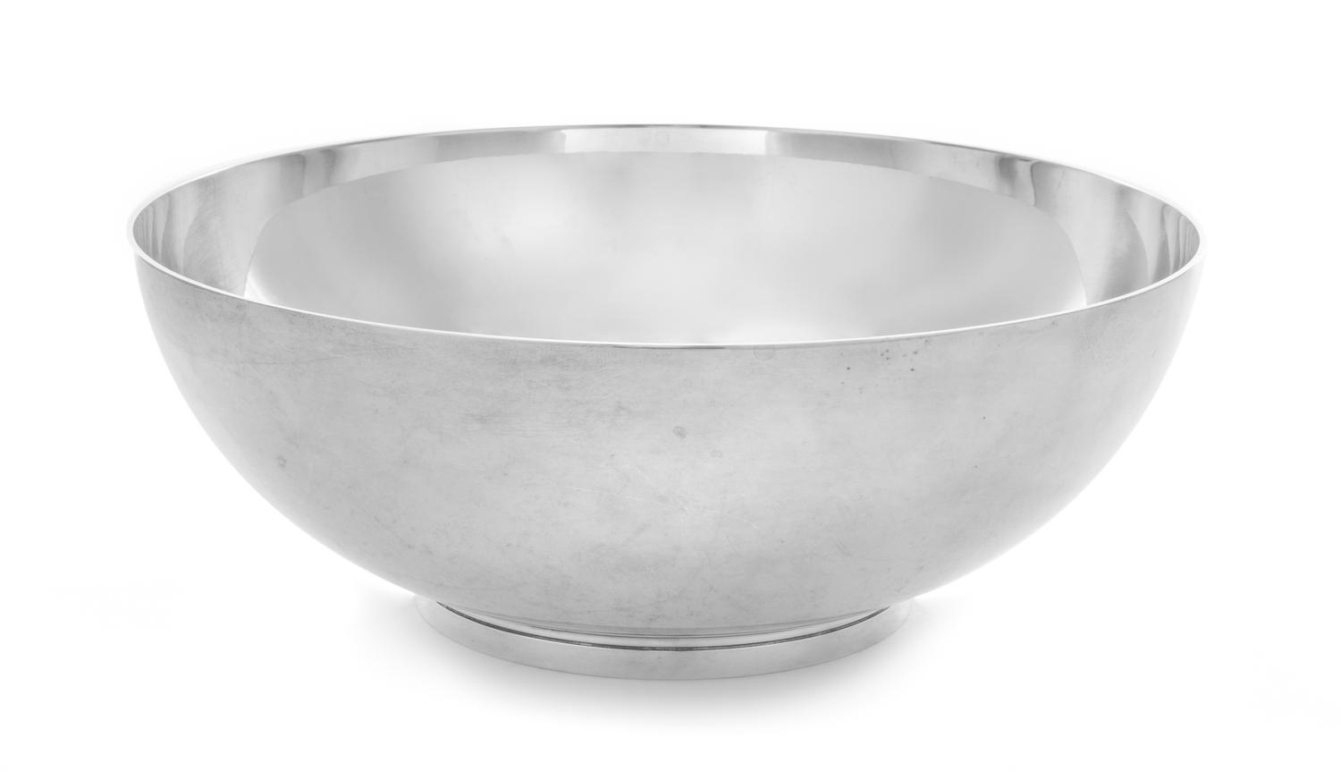 An American Silver Center Bowl, Tiffany & Co., New York, NY, the bowl centered with engraved monogram CDC, raised on a circular foot.