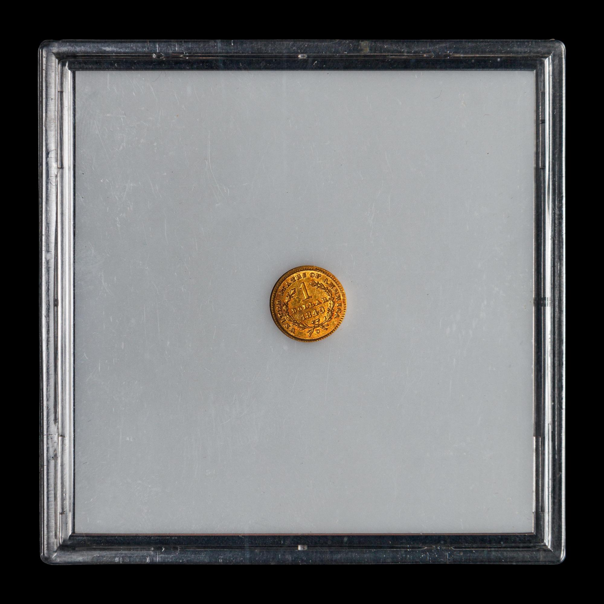 An 1849-C Liberty Head: Closed Wreath $1 Gold Coin