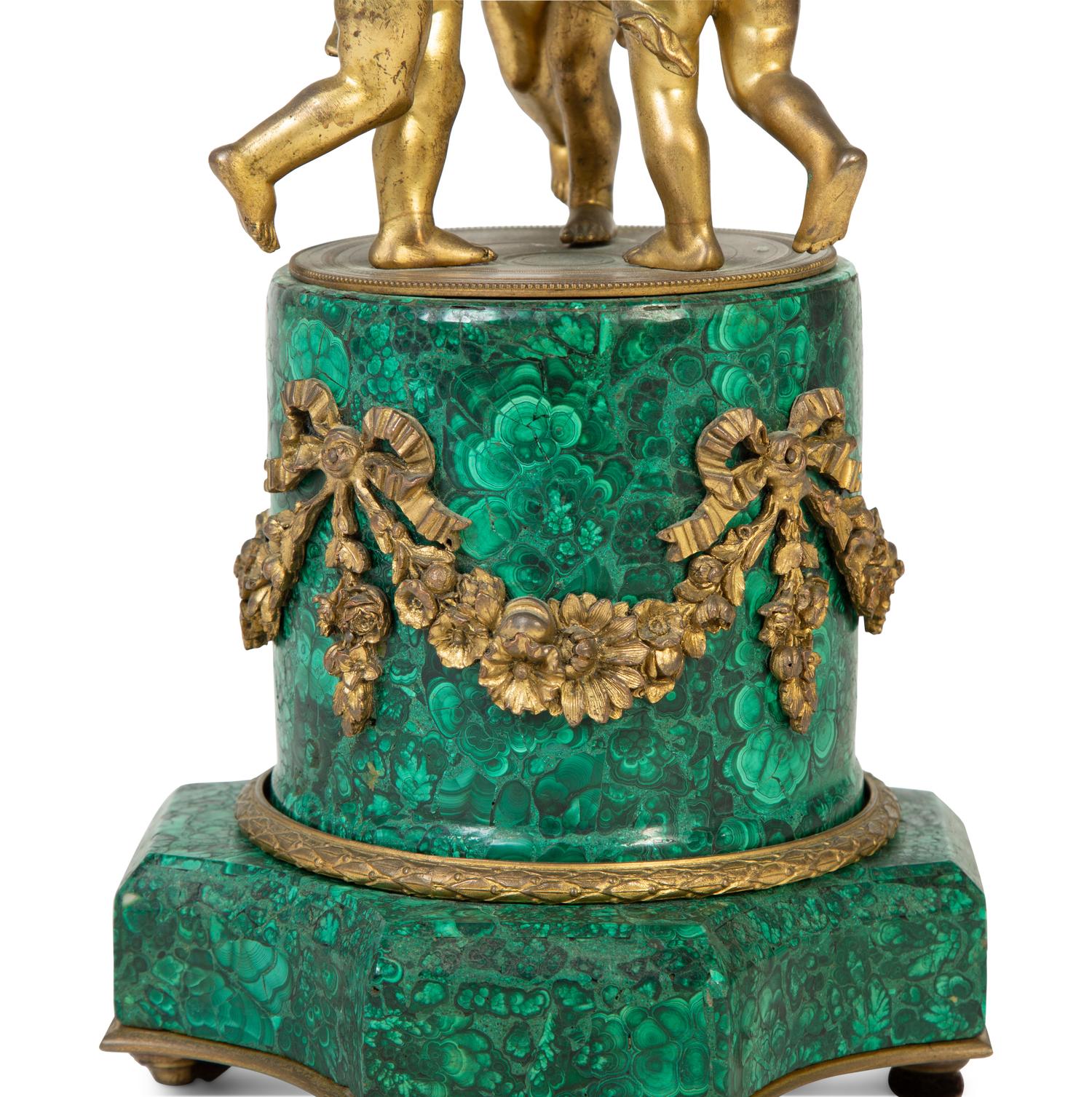 A French Empire Style Gilt Bronze Mounted Malachite Clock — 19TH CENTURY