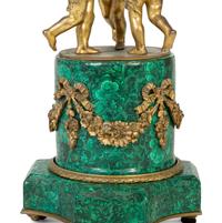 A French Empire Style Gilt Bronze Mounted Malachite Clock — 19TH CENTURY
