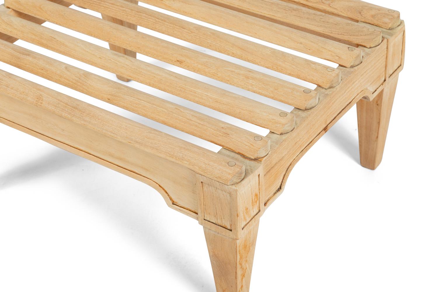 A Teak Outdoor Nine-Piece Furniture Suite