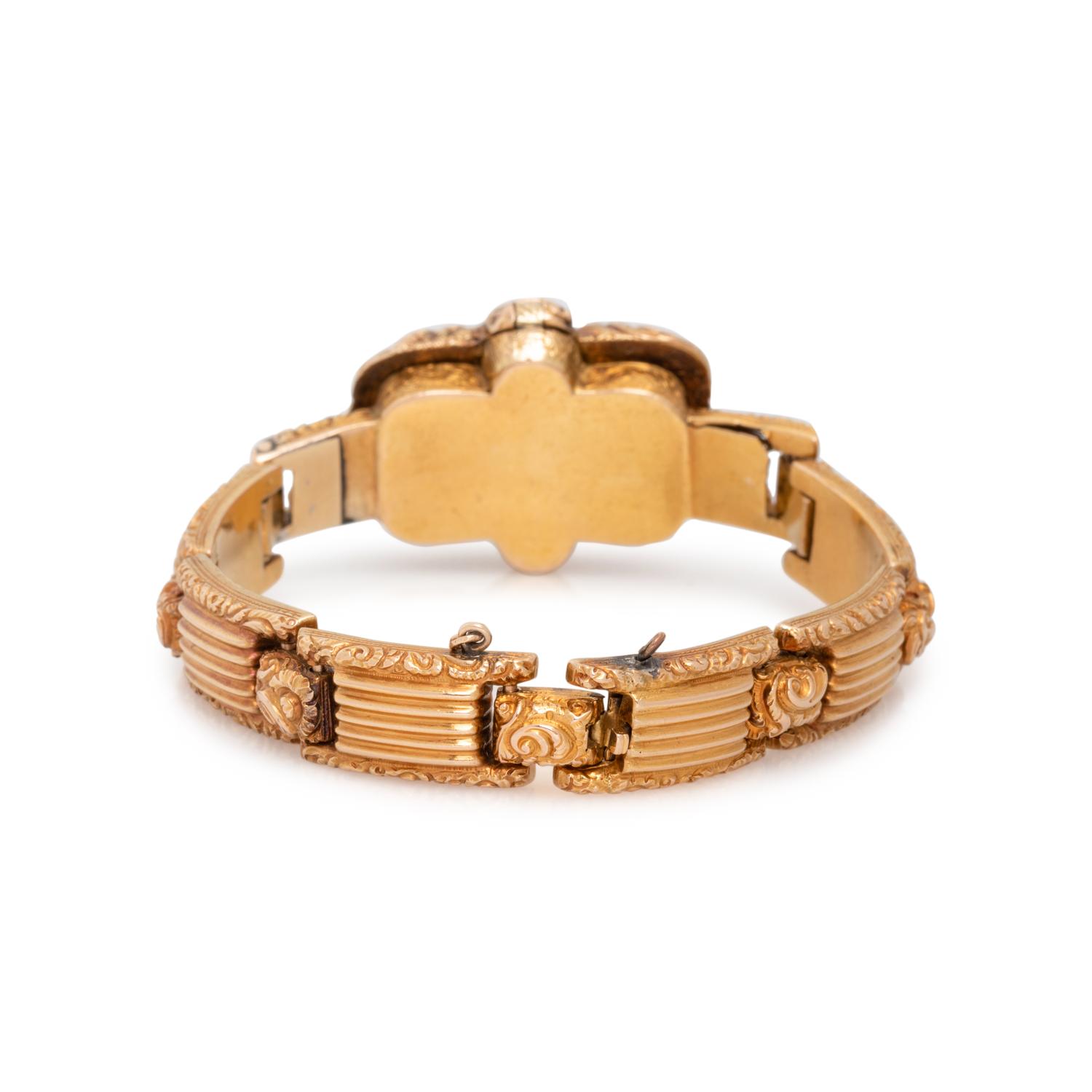 GEORGIAN, YELLOW GOLD AND GEMSTONE LOCKET BRACELET