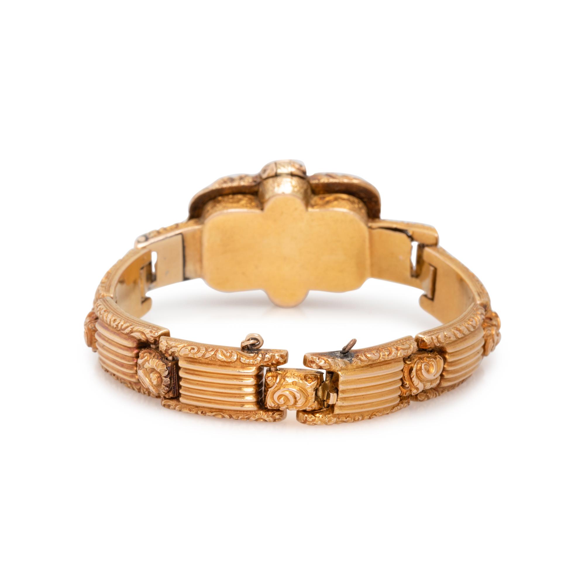 GEORGIAN, YELLOW GOLD AND GEMSTONE LOCKET BRACELET