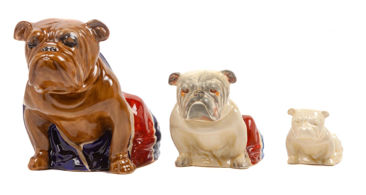A Group of Three Royal Doulton Bulldogs Height of tallest 6 inches.
