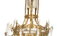 An Empire Style Gilt Metal and Cut Glass Ten-Light Chandelier
