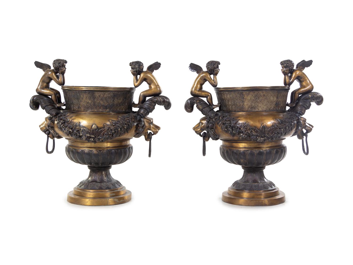 A Pair of Continental Gilt and Patinated Bronze Urns