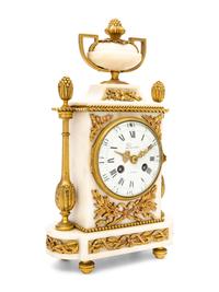 A French Gilt Bronze and Marble Clock
