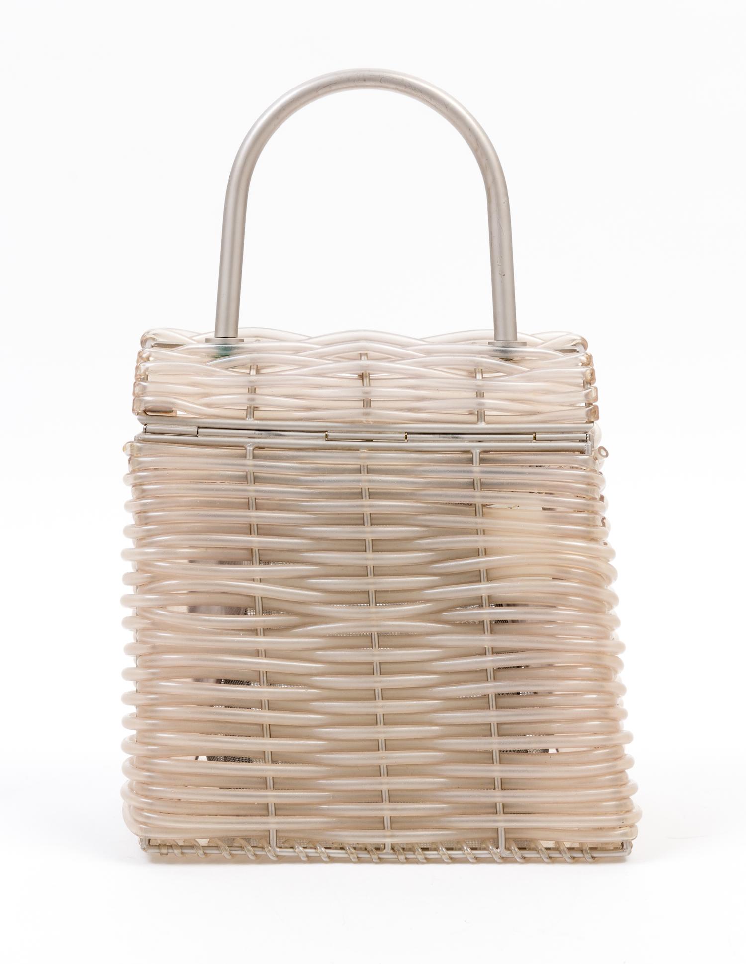 A Salvatore Ferragamo Gancini Plastic Weave Handbag, 8" x 8" x 4.5"; Handle drop: 4".