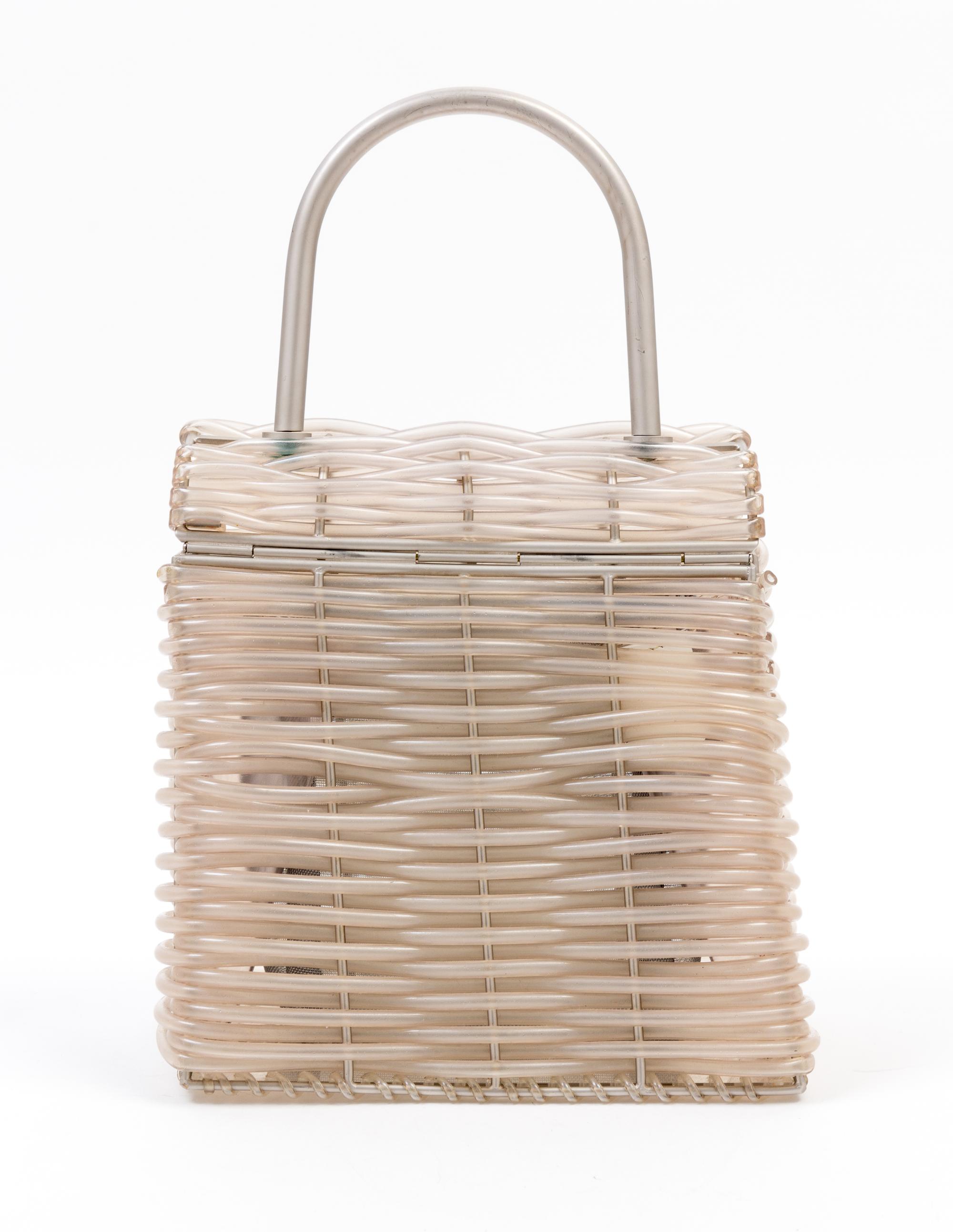 A Salvatore Ferragamo Gancini Plastic Weave Handbag, 8" x 8" x 4.5"; Handle drop: 4".