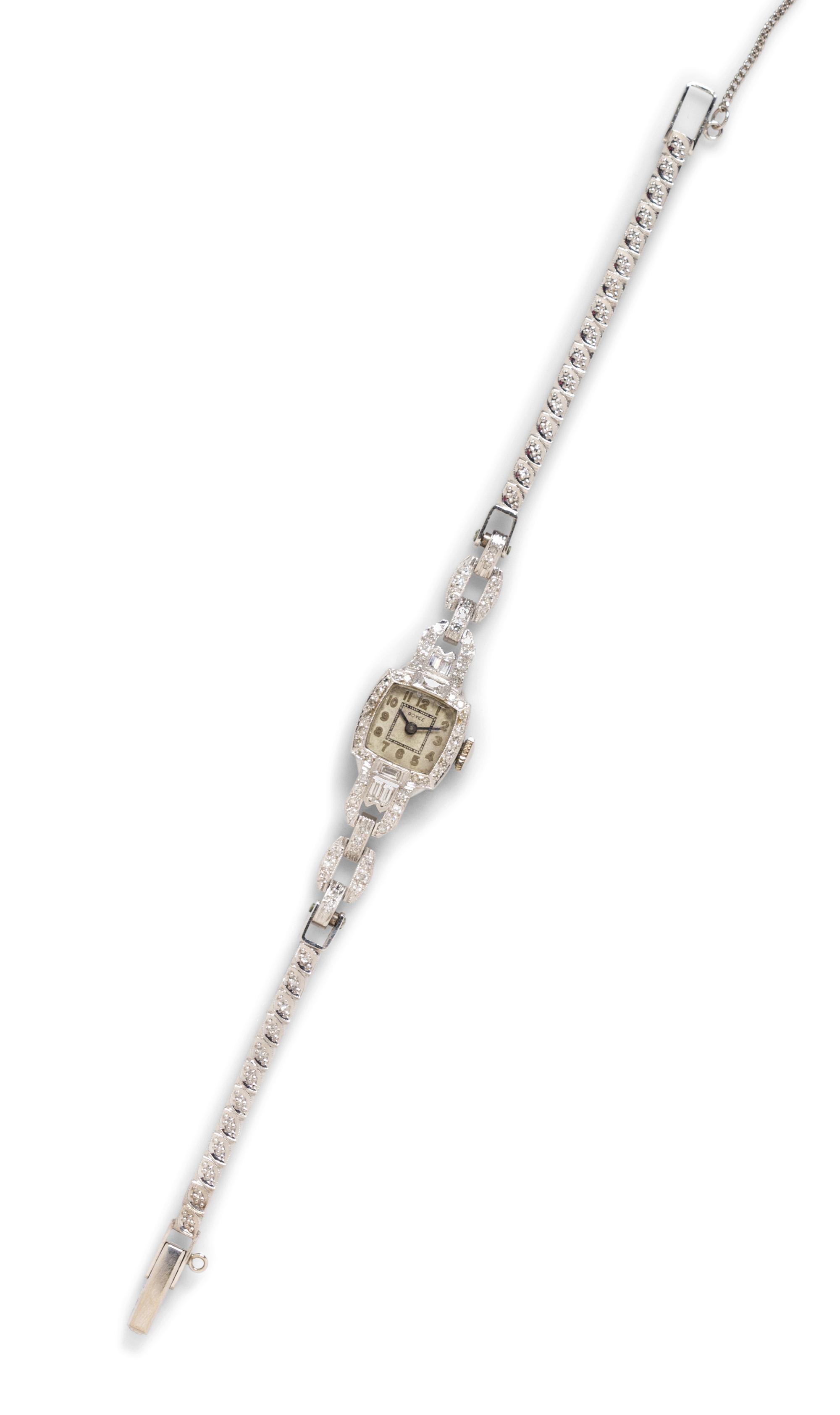 A Vintage Platinum, 14 Karat White Gold and Diamond Wristwatch, Royce, 11.40 dwts.
