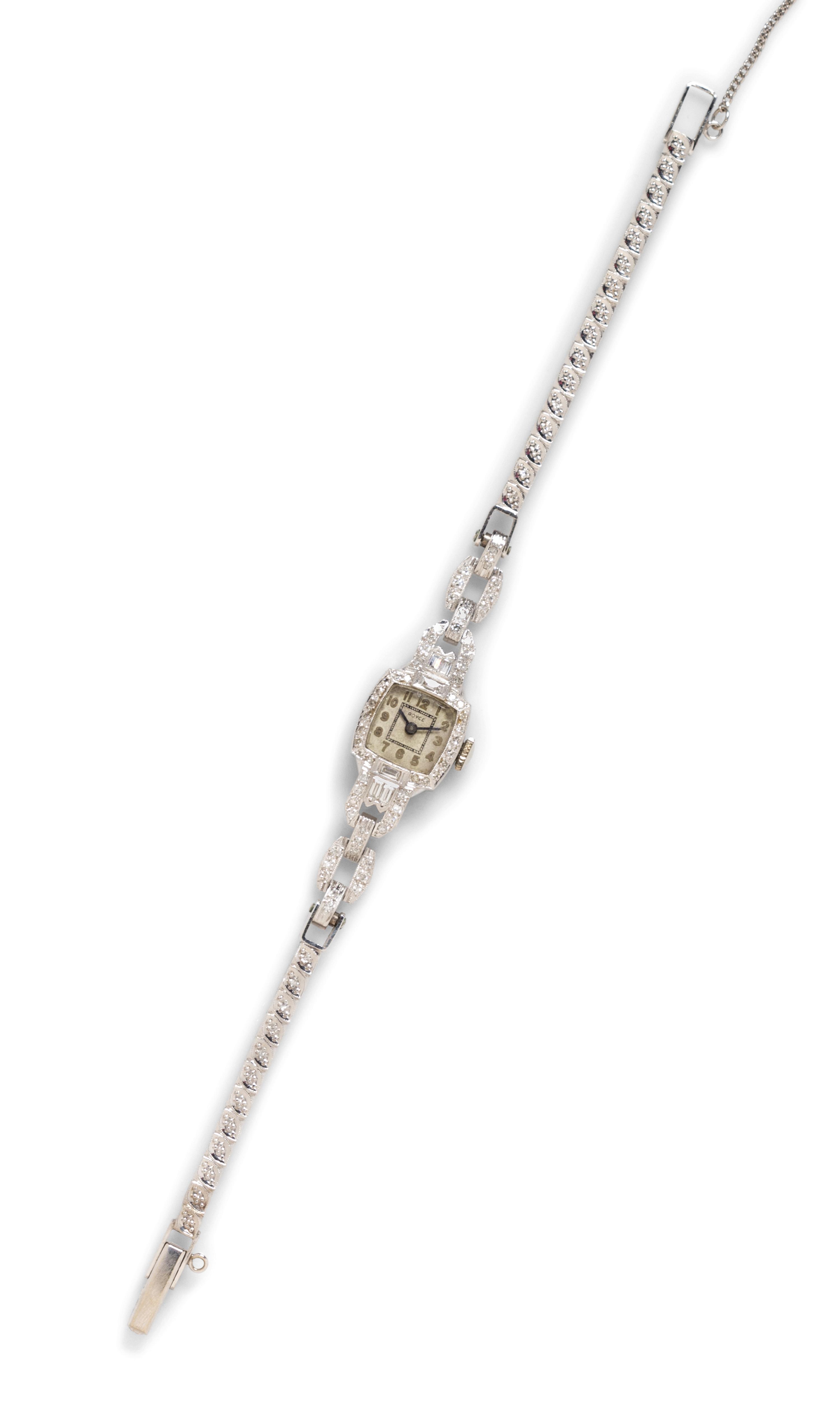 A Vintage Platinum, 14 Karat White Gold and Diamond Wristwatch, Royce, 11.40 dwts.