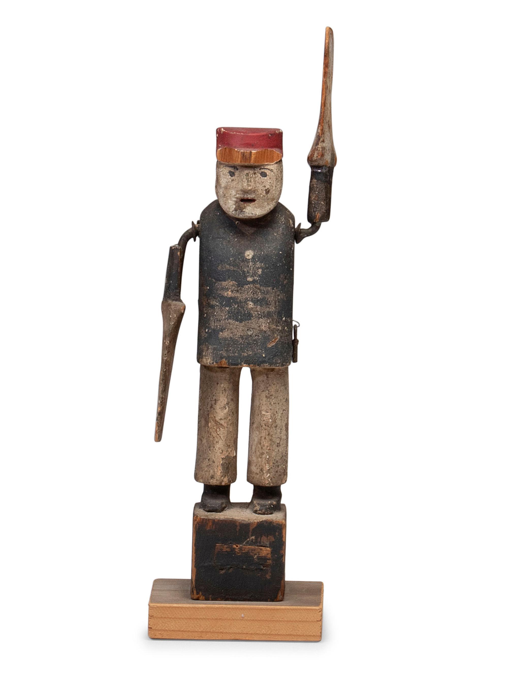 A Carved and Painted Wood Whirligig
