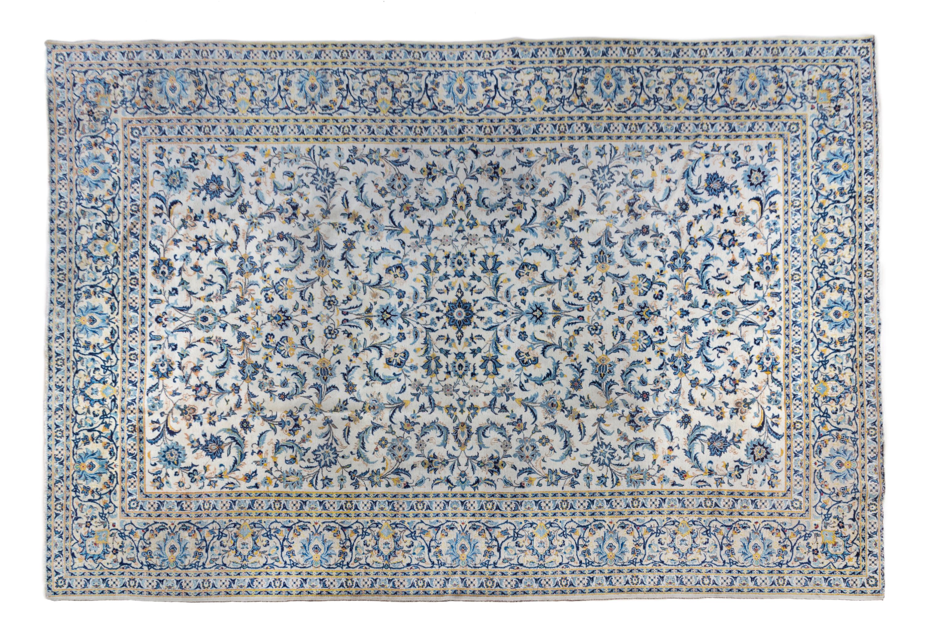 A Kashan Wool Rug 14 feet 10 inches x 10 feet 3 inches.