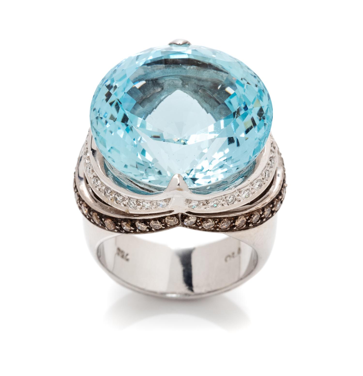 An 18 Karat White Gold, Aquamarine, Diamond and Colored Diamond Ring, 17.23 dwts.