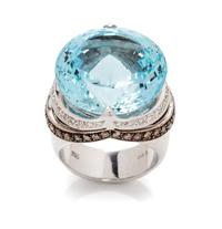 An 18 Karat White Gold, Aquamarine, Diamond and Colored Diamond Ring, 17.23 dwts.