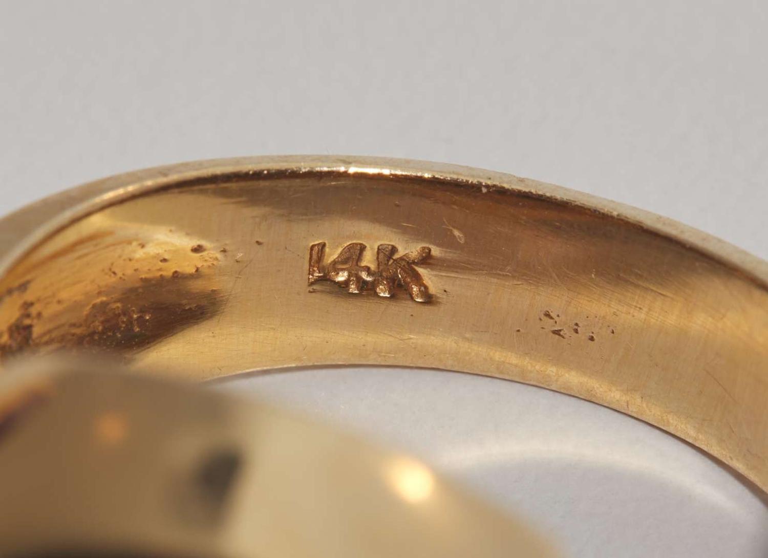 A Pair of Yellow Gold and Amethyst Rings